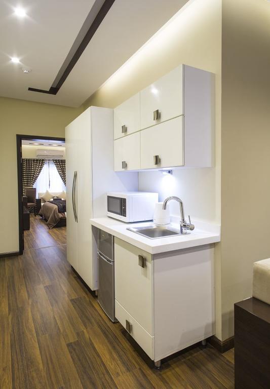 Royaute Luxury Suites And Hotel Gulberg Lahore Habitación foto